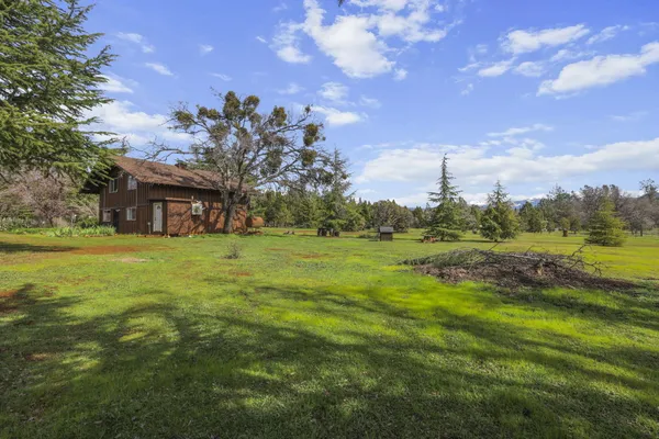 a view of house with garden