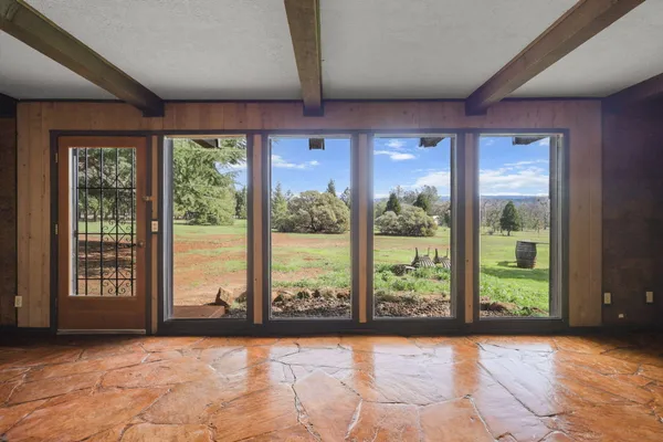 a view of an entryway with a garden