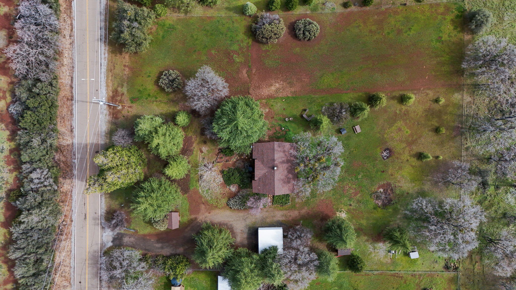 5040 Wilson Hill Road Manton, CA 96059 - Photo 37 of 37 an aerial view of a house with a yard