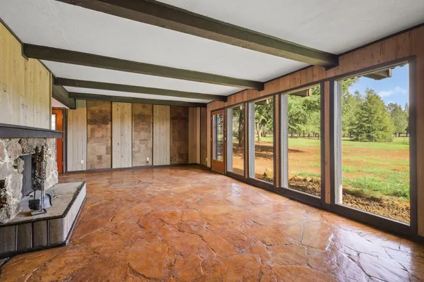 a view of an empty room and window