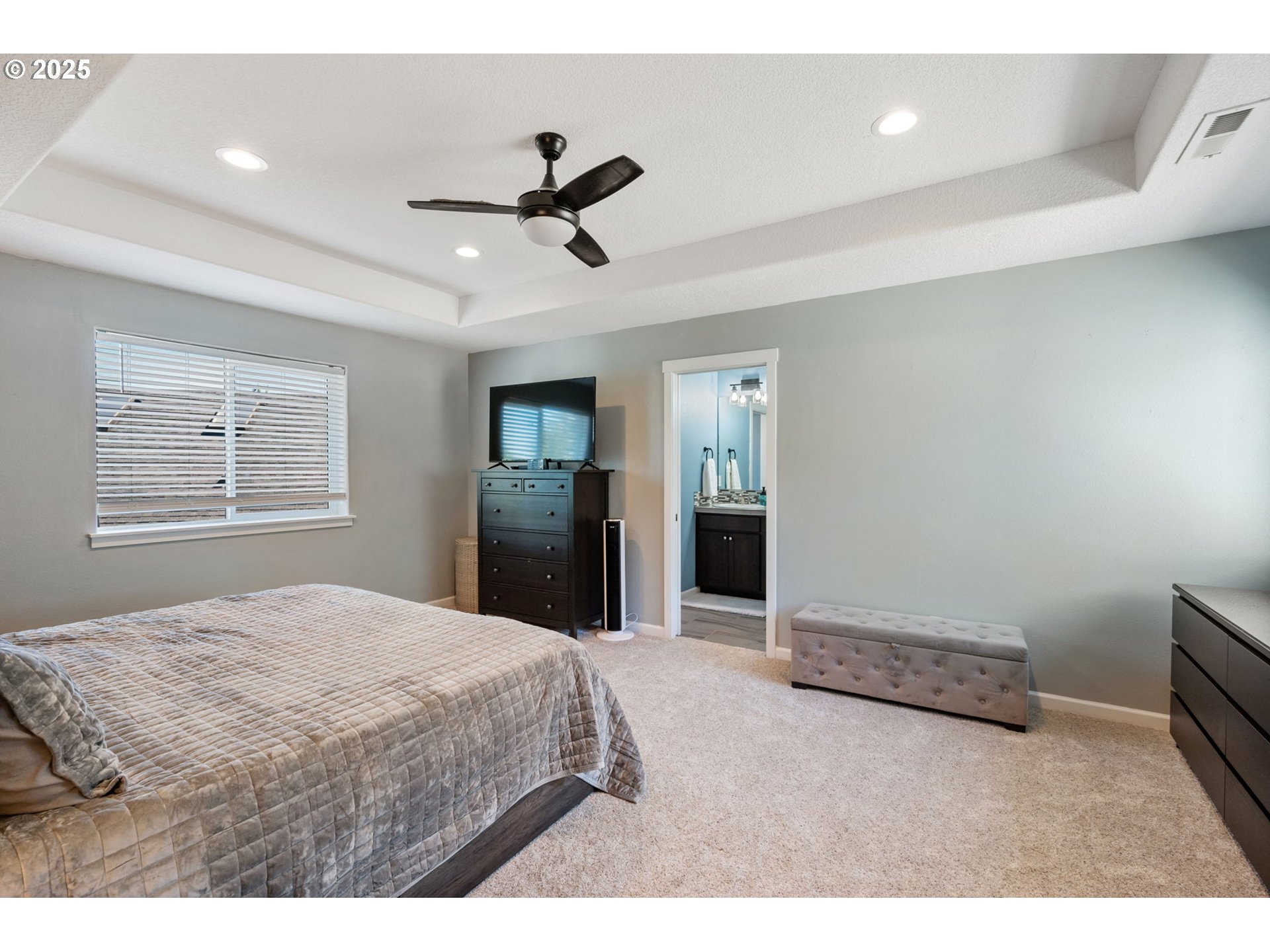 2820 Southeast Baker Avenue Gresham, OR 97080 - Photo 16 of 33 a bedroom with a bed and a view of bathroom