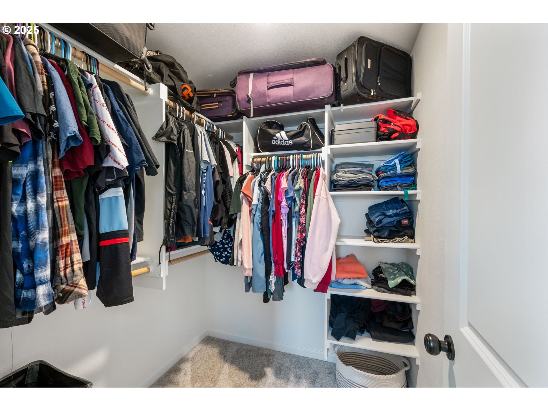 2820 Southeast Baker Avenue Gresham, OR 97080 - Photo 19 of 33 a view of walk in closet with clothes and shoes