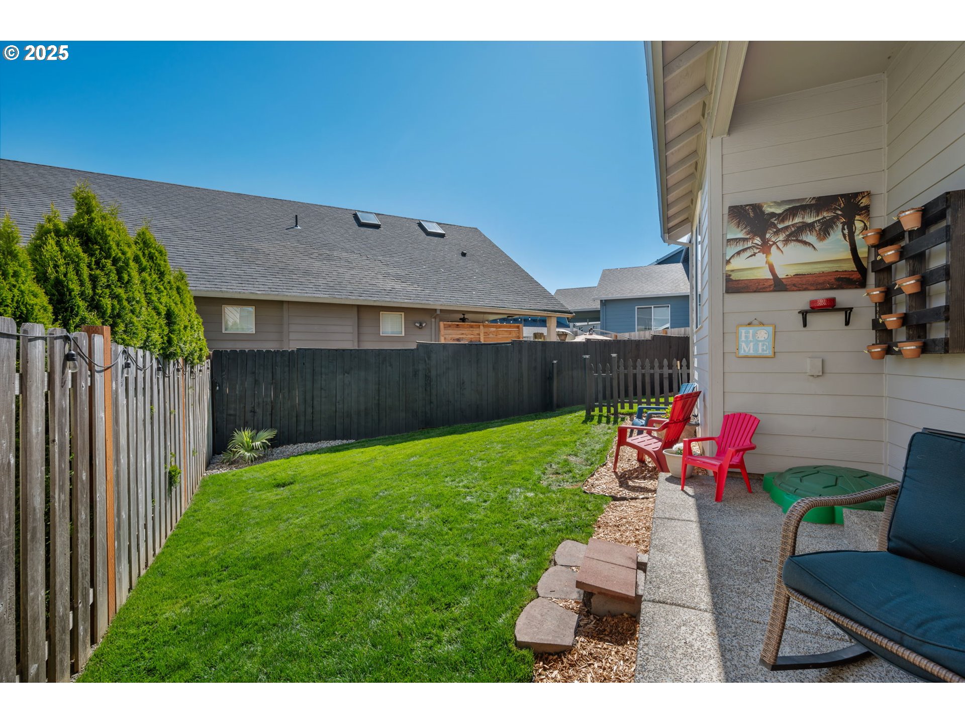 2820 Southeast Baker Avenue Gresham, OR 97080 - Photo 27 of 33 a backyard of a house with seating space
