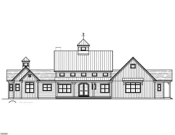 a black and white photo of a house