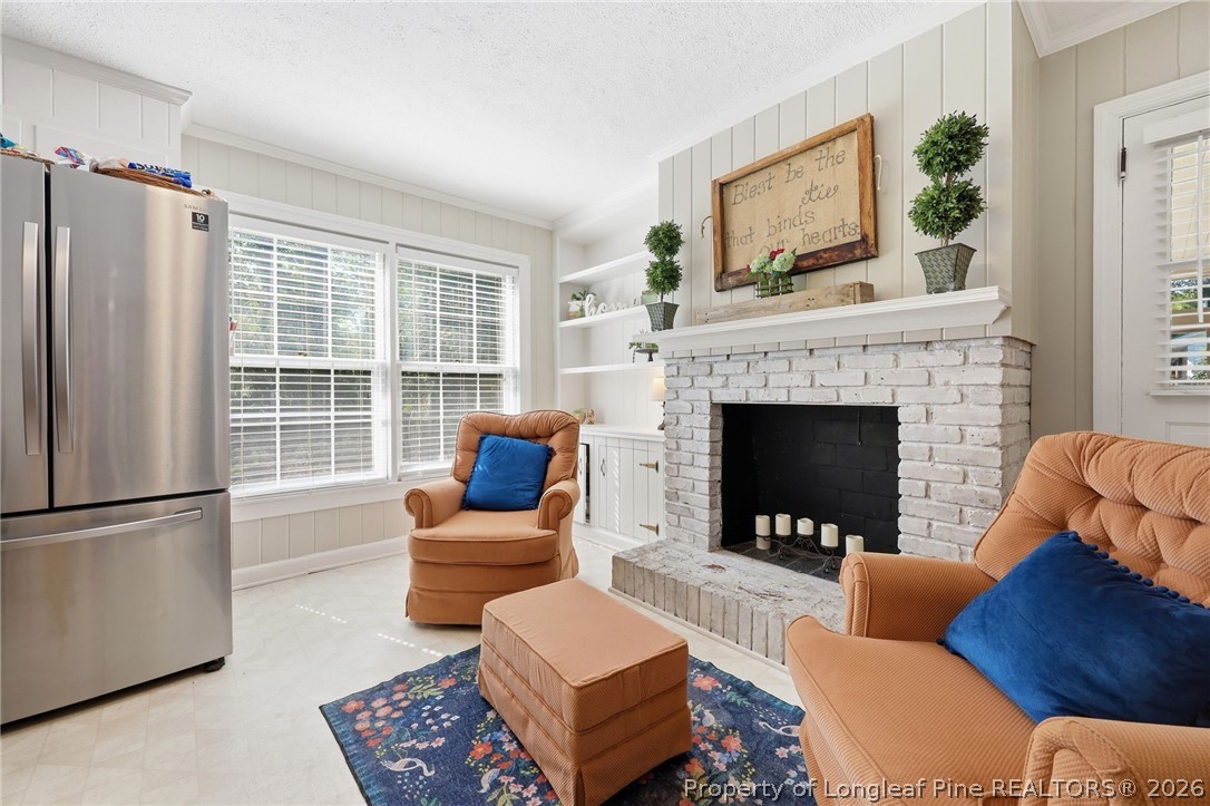1322 Carolina Drive Rockingham, NC 28379 - Photo 14 of 28 a living room with furniture and a fireplace