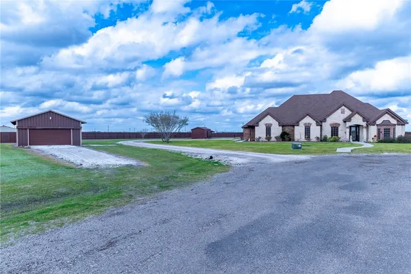 a view of house with yard and street view