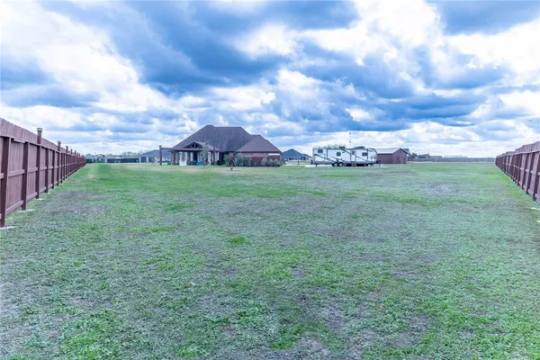 a view of a garden with a pathway