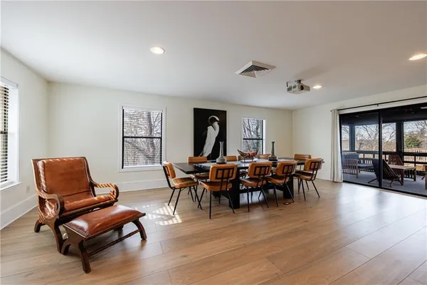 an aerial view of a house with a big yard