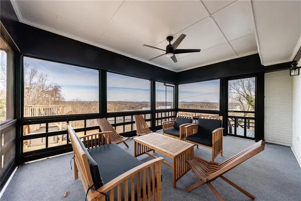 a view of swimming pool from a balcony