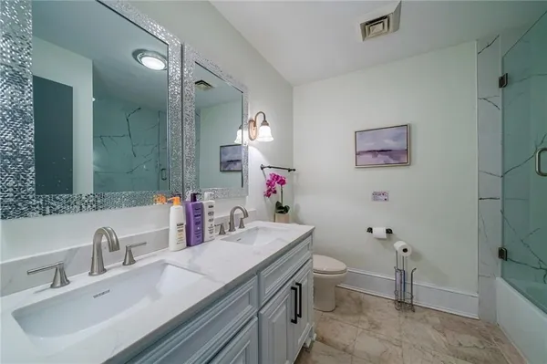 a view of balcony with deck and wooden floor
