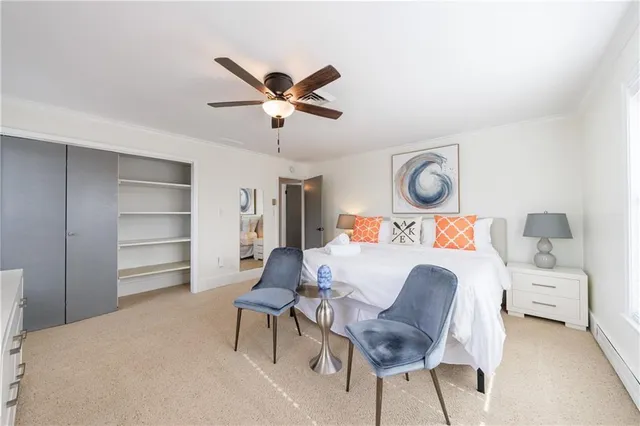 a view of balcony with wooden fence and trees
