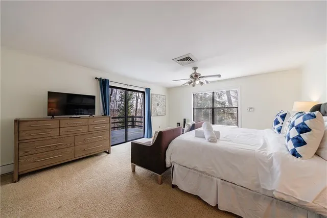 a view of balcony with deck and wooden floor