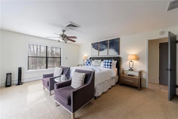 a view of lake with green space