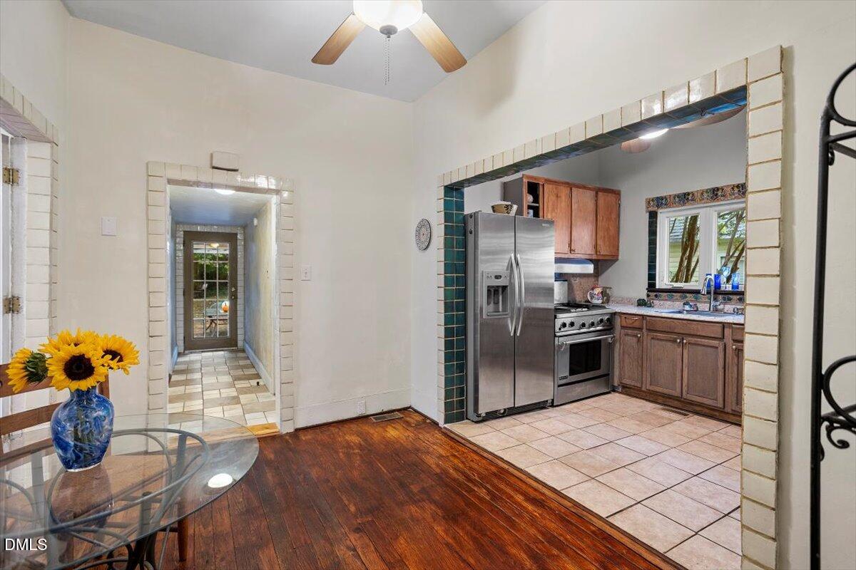 206 North State Street Raleigh, NC 27601 - Photo 16 of 21 Dine in style! A spacious dining area with high ceilings and wood floors connects seamlessly to the kitchen making both entertaining and every day meals a breeze.