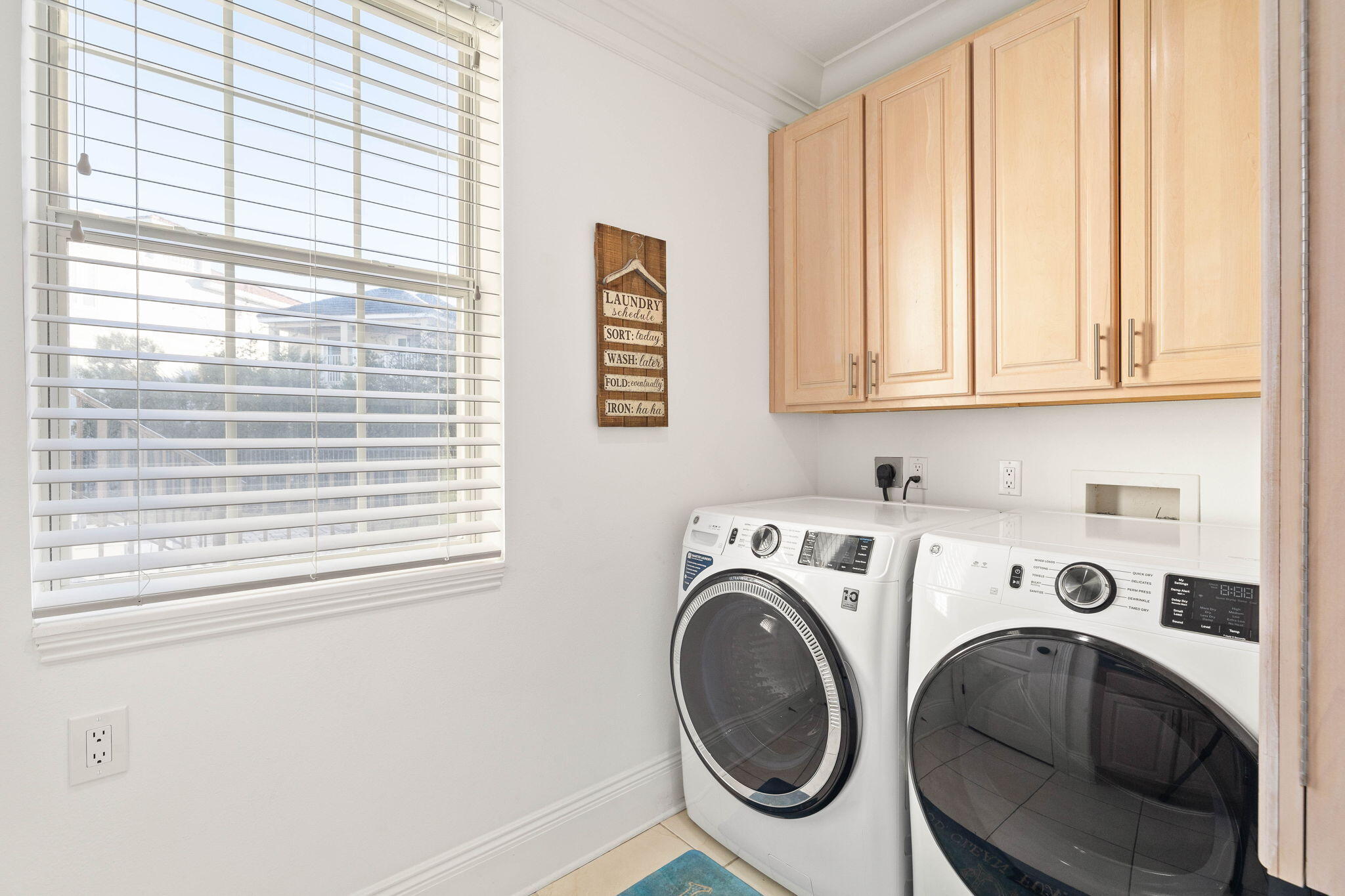 9 St Barts Bay Destin, FL 32541 - Photo 11 of 33 a utility room with dryer and washer