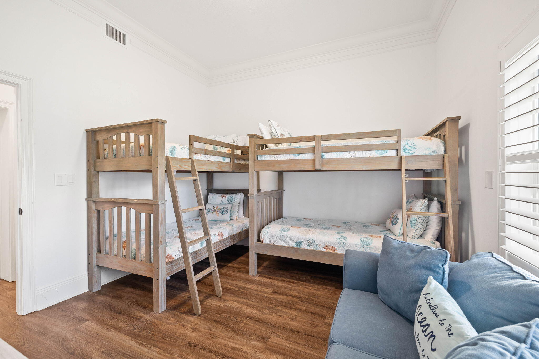 9 St Barts Bay Destin, FL 32541 - Photo 12 of 33 a bedroom with a bed and wooden floor