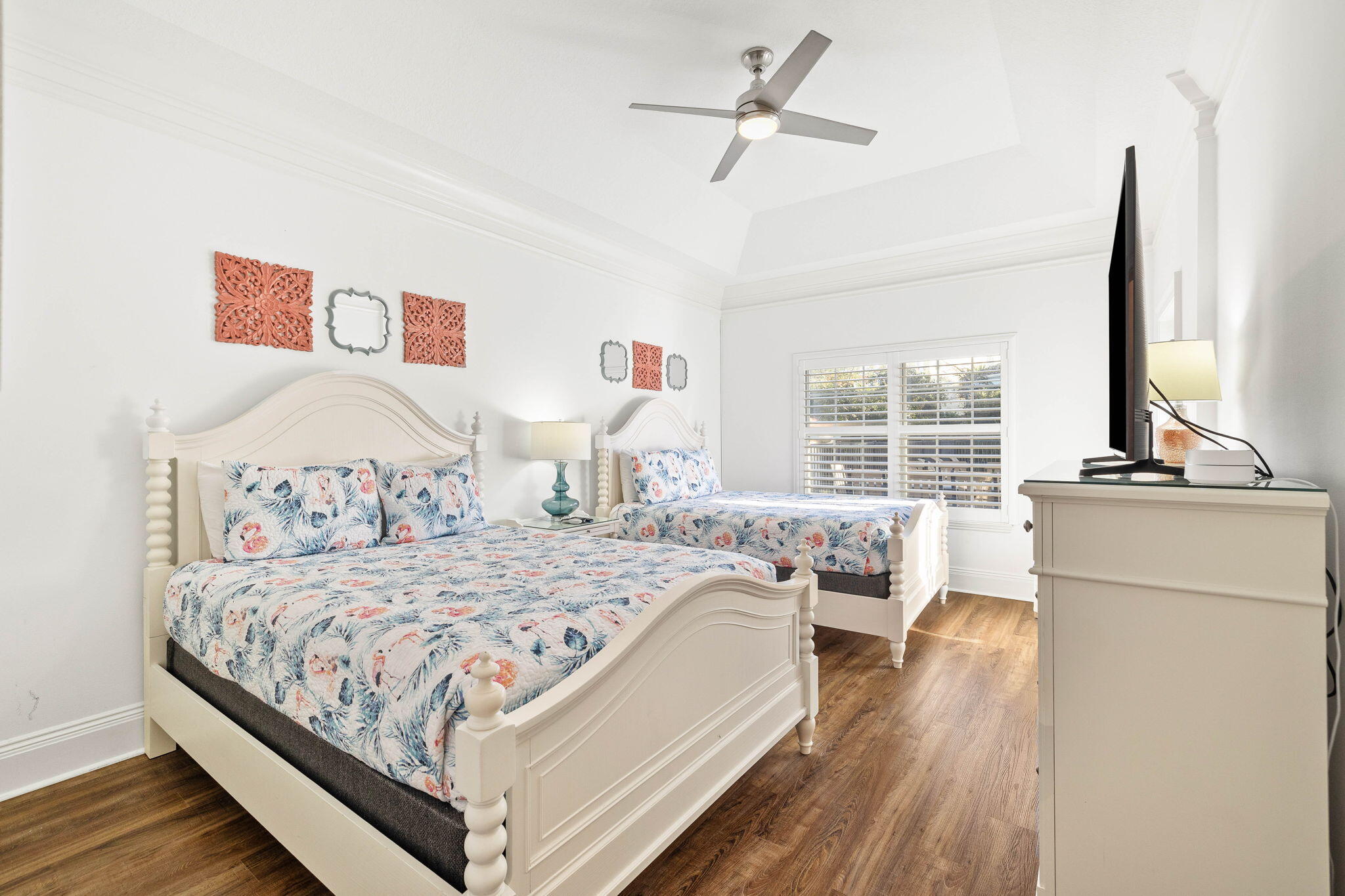 9 St Barts Bay Destin, FL 32541 - Photo 13 of 33 a bedroom with a large bed and a chandelier