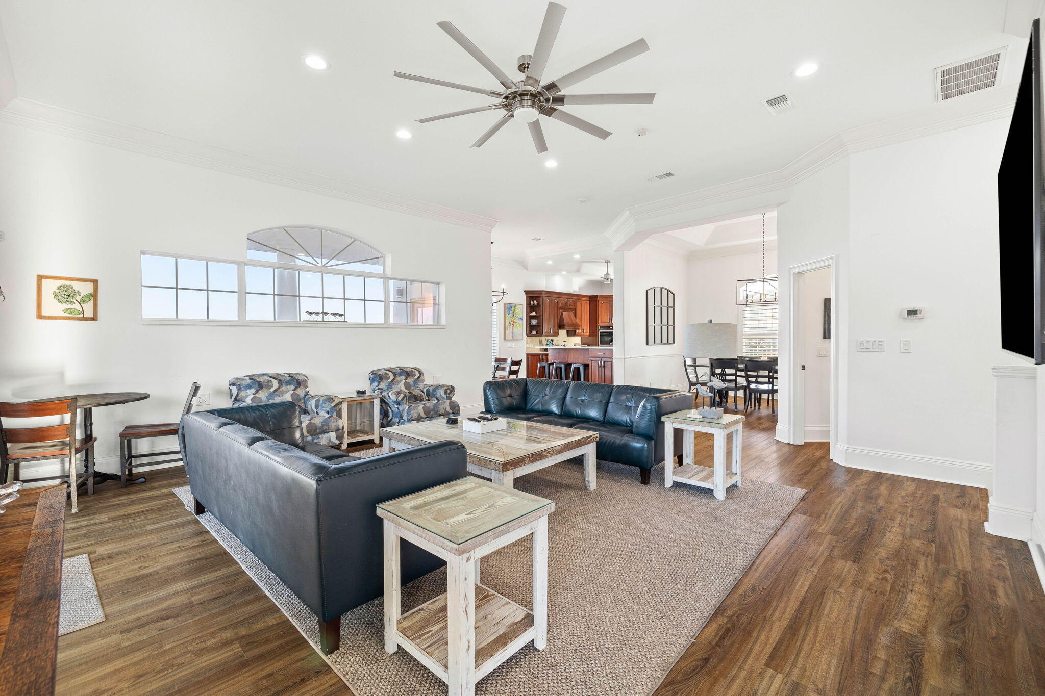 9 St Barts Bay Destin, FL 32541 - Photo 15 of 33 a living room with lots of furniture and kitchen view