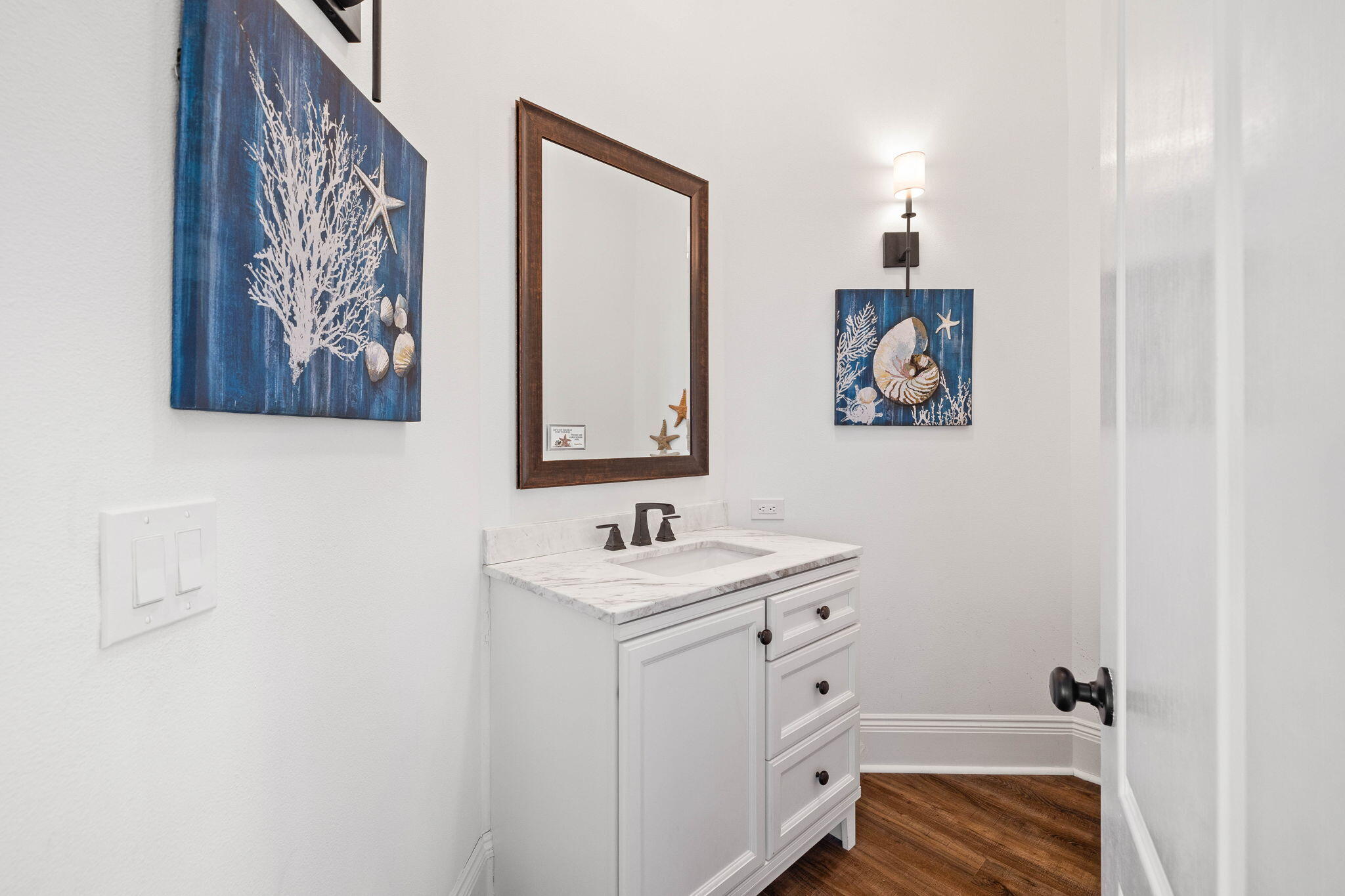 9 St Barts Bay Destin, FL 32541 - Photo 16 of 33 a bathroom with a sink and a mirror
