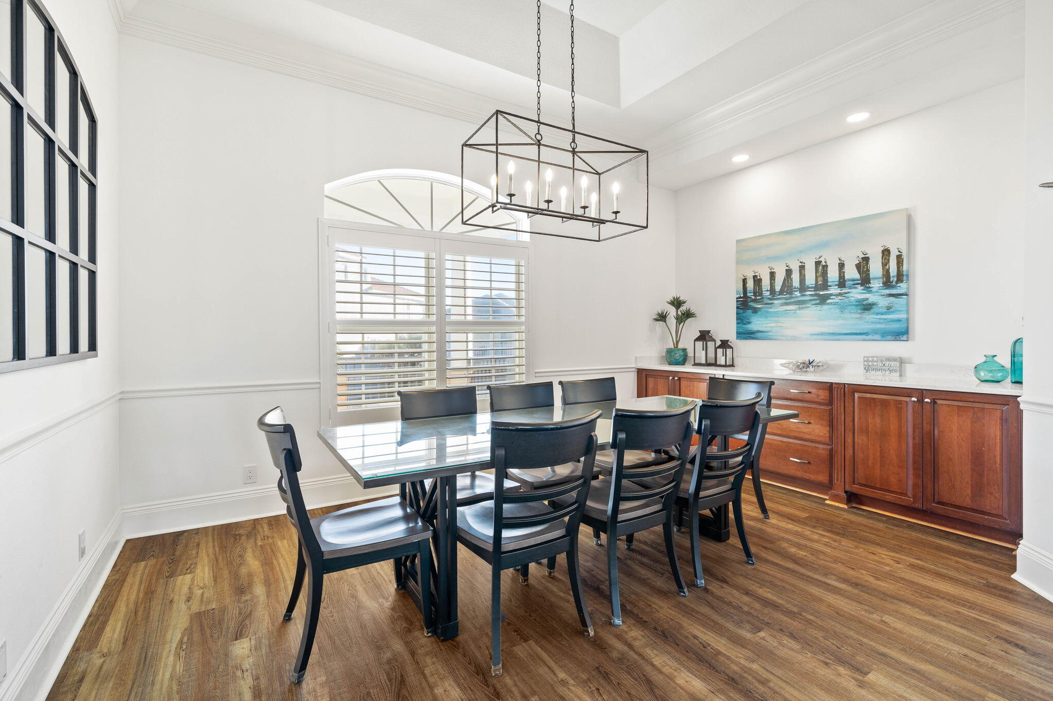 9 St Barts Bay Destin, FL 32541 - Photo 17 of 33 a view of a dining room with furniture window and wooden floor