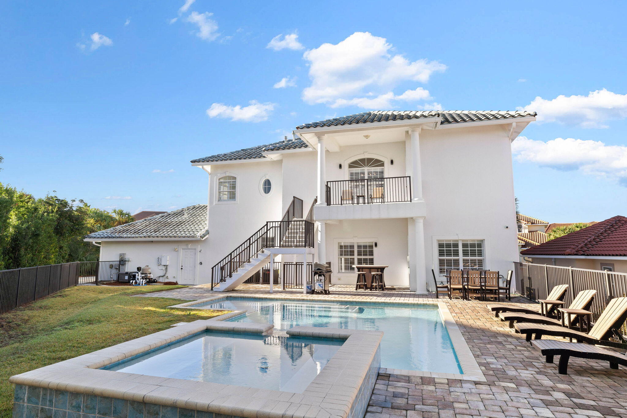 9 St Barts Bay Destin, FL 32541 - Photo 2 of 33 a view of a house with pool and chairs