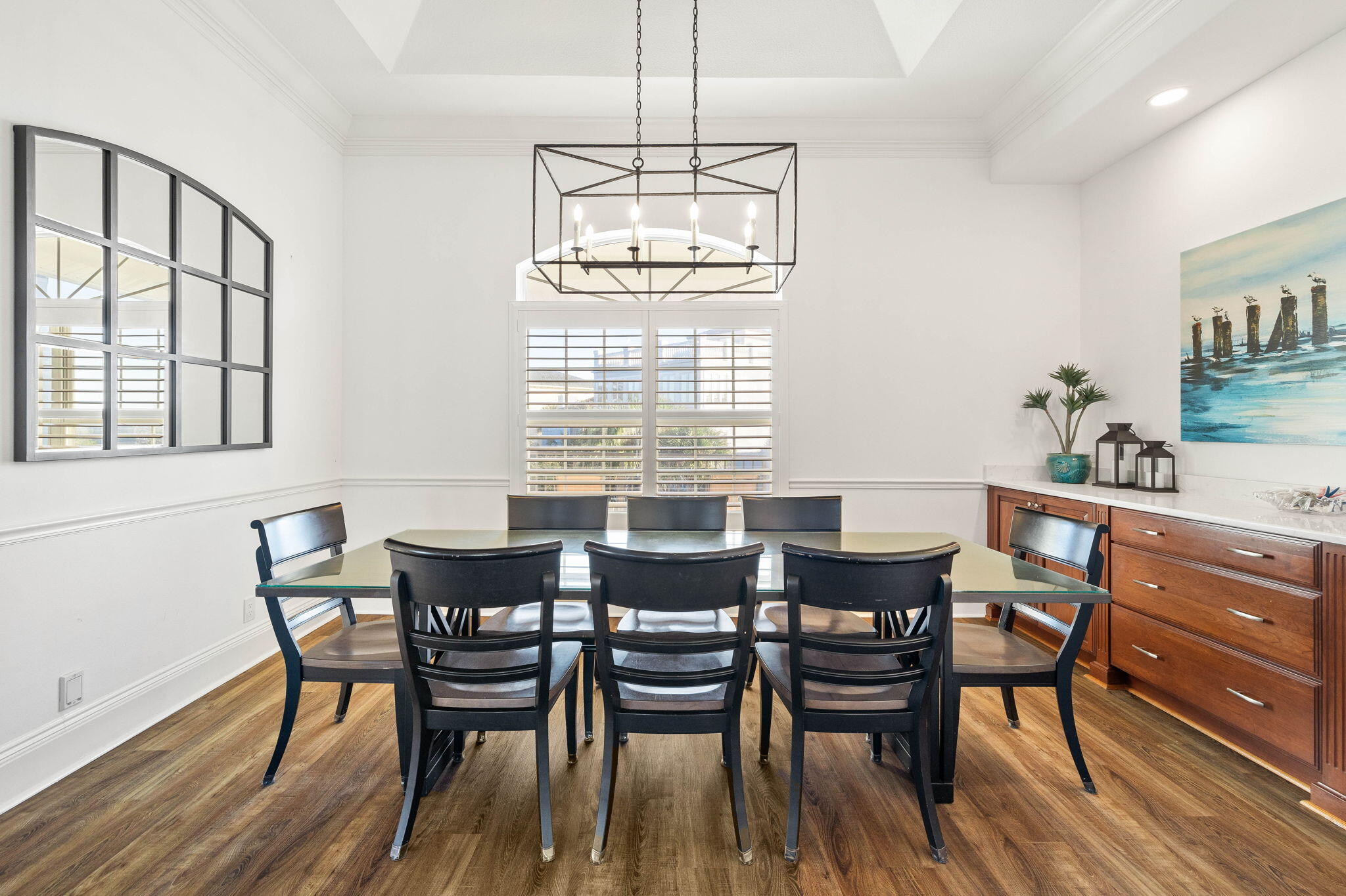 9 St Barts Bay Destin, FL 32541 - Photo 4 of 33 a dining room with furniture a chandelier and wooden floor