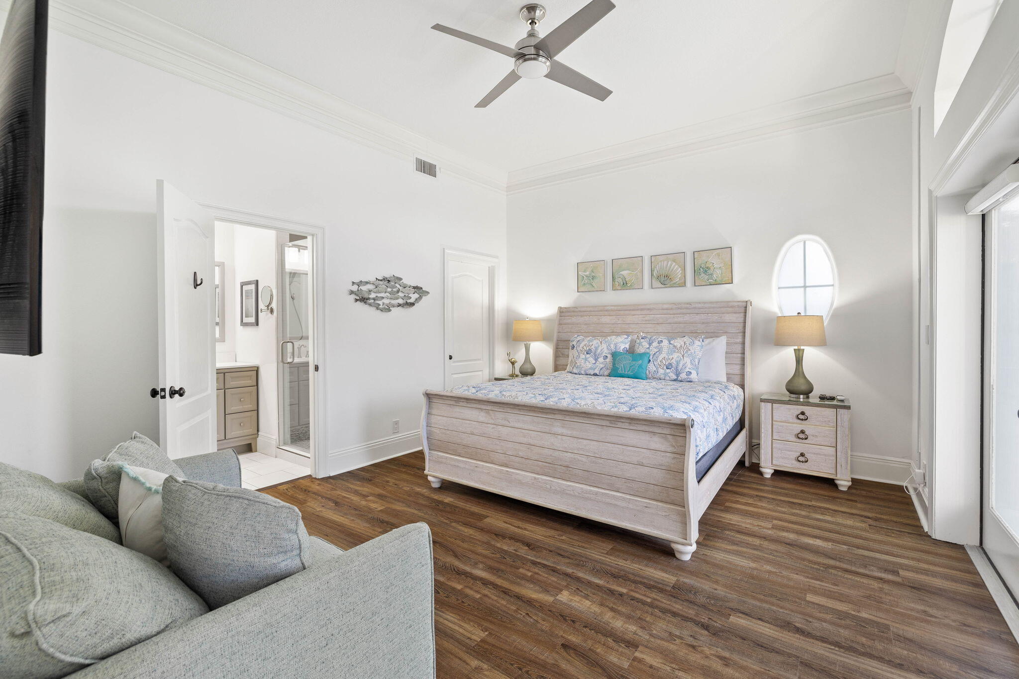 9 St Barts Bay Destin, FL 32541 - Photo 7 of 33 a spacious bedroom with a bed and wooden floor