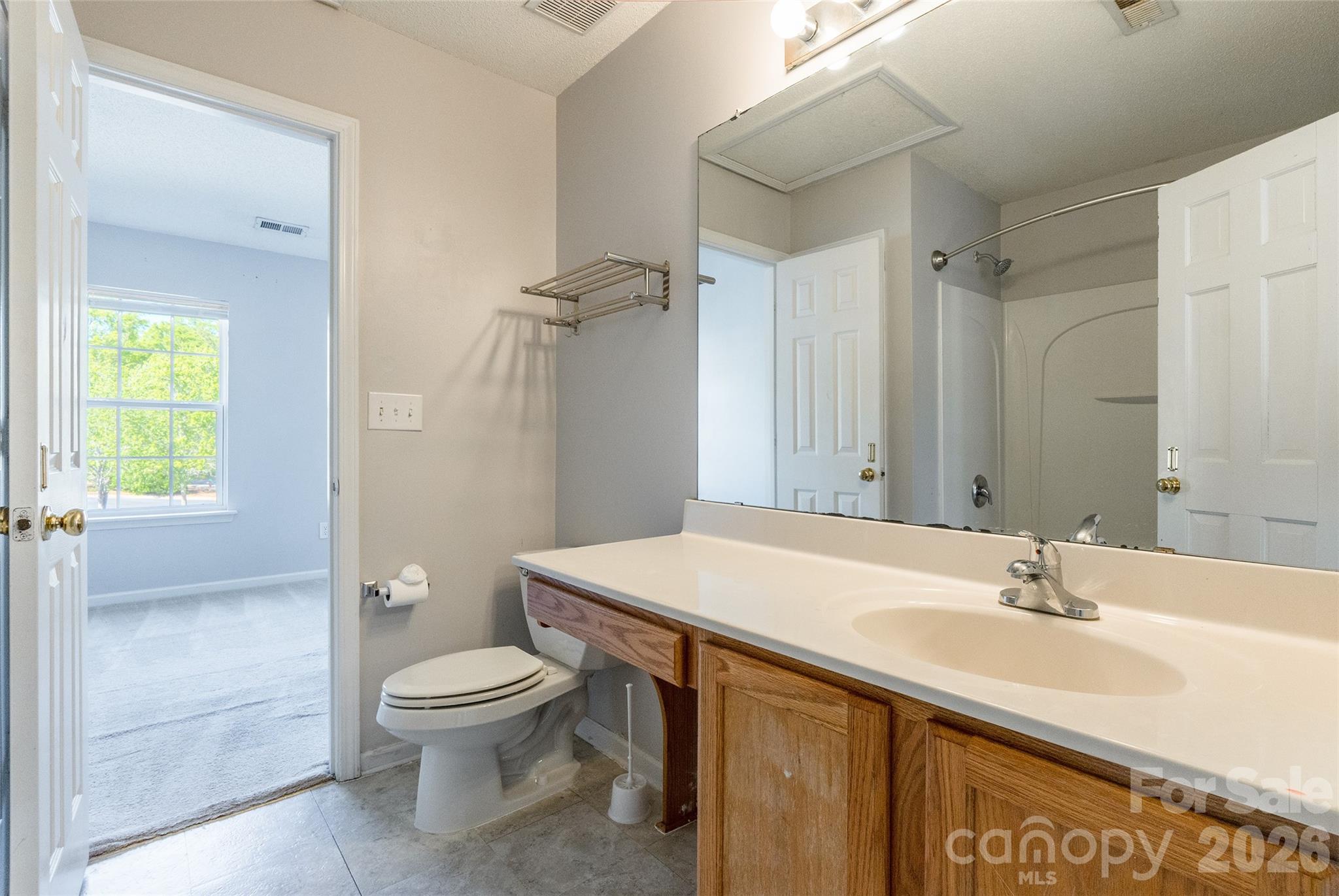 4024 Ashby Lane Fort Mill, SC 29707 - Photo 14 of 21 a bathroom with a sink toilet and shower
