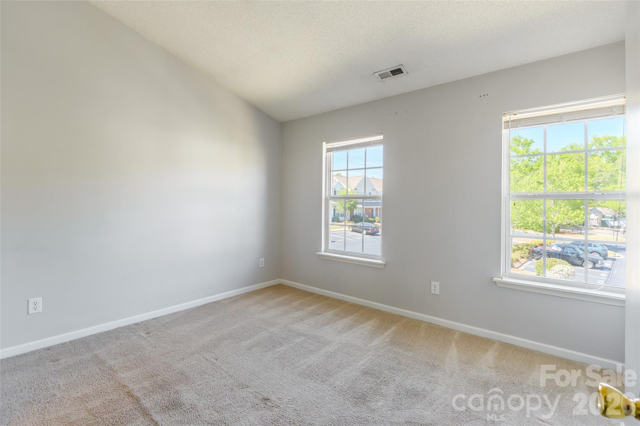 4024 Ashby Lane Fort Mill, SC 29707 - Photo 16 of 21 an empty room with windows