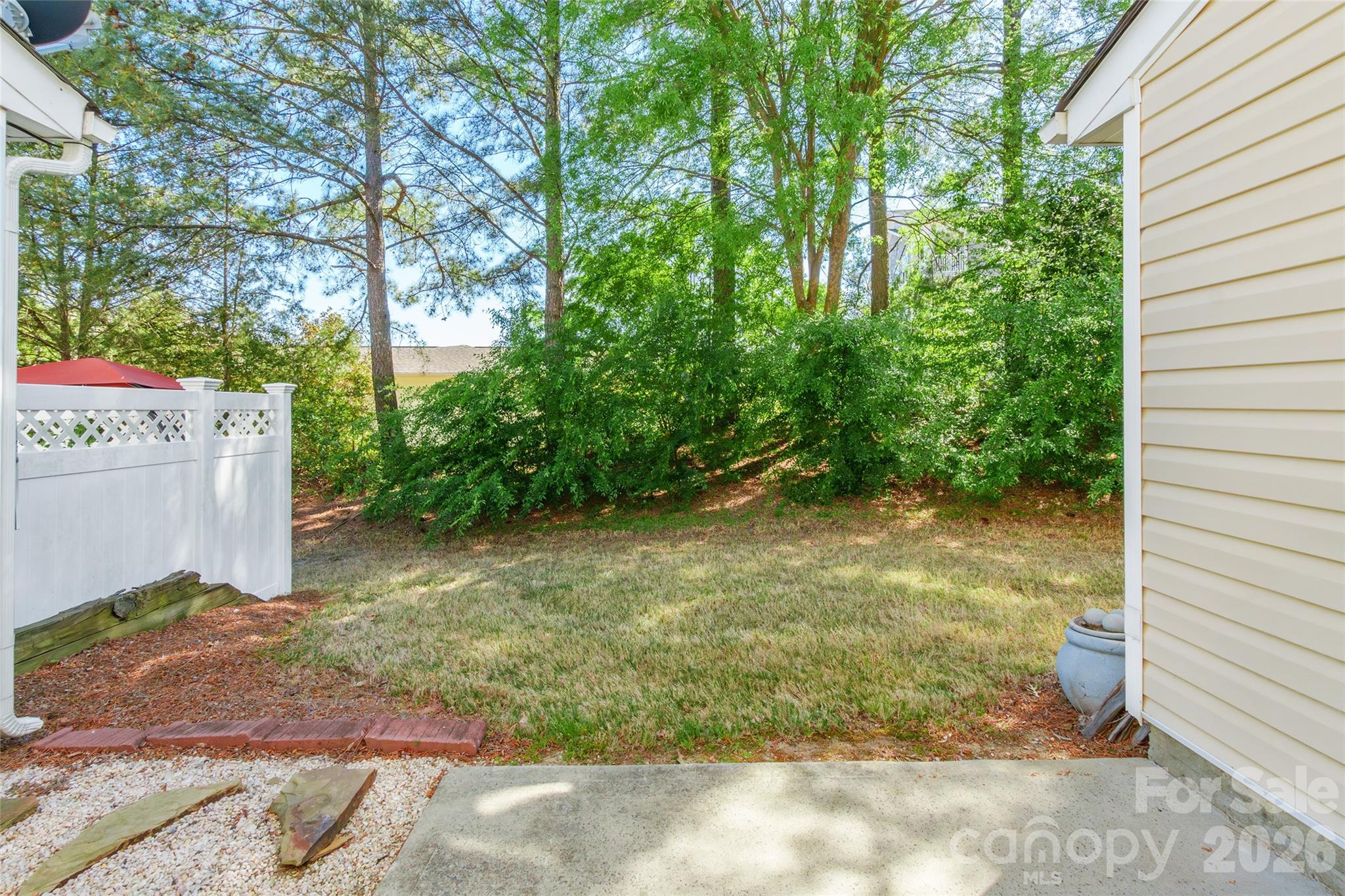 4024 Ashby Lane Fort Mill, SC 29707 - Photo 18 of 21 a view of a yard with plants and large trees