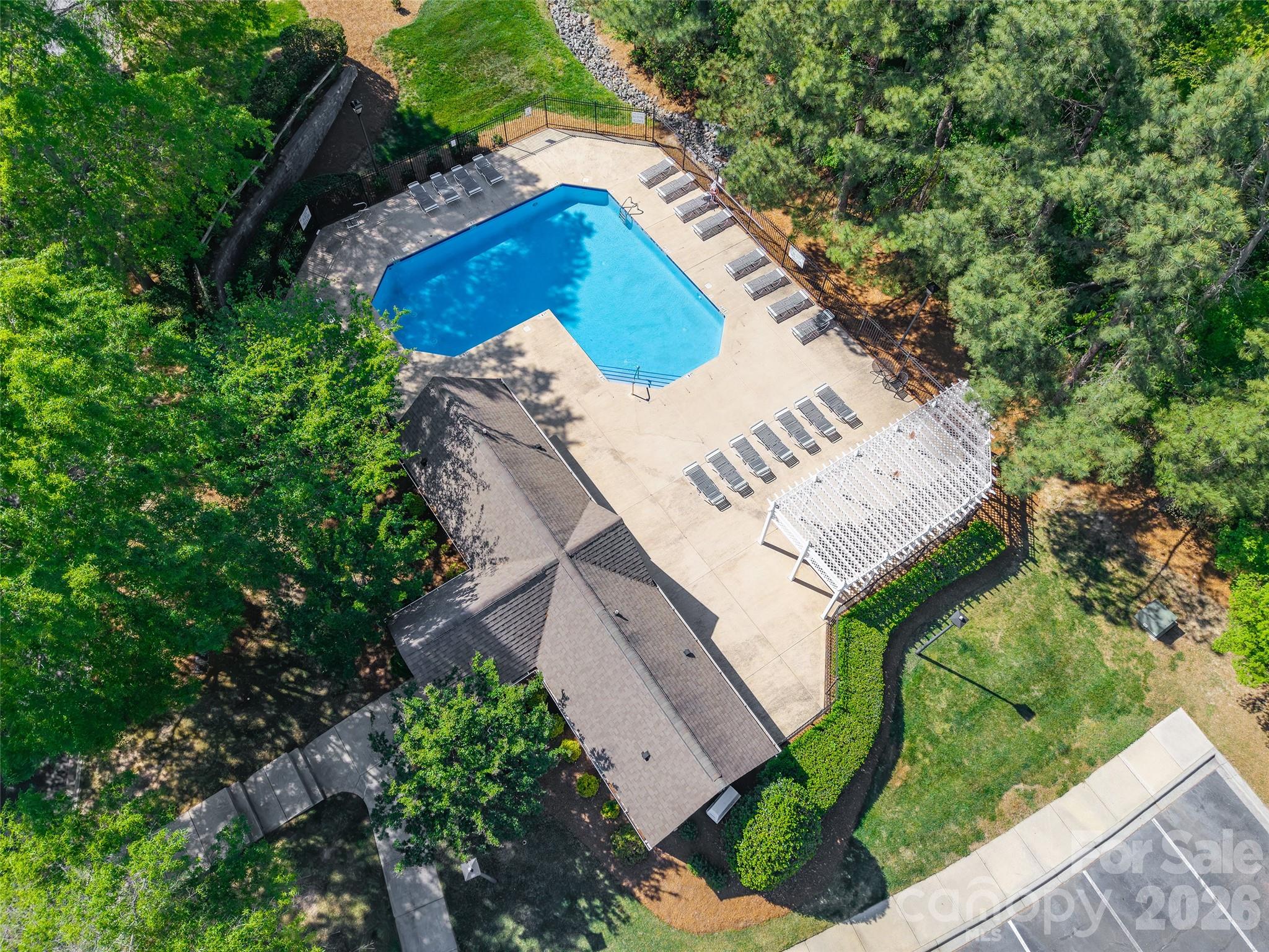 4024 Ashby Lane Fort Mill, SC 29707 - Photo 20 of 21 an aerial view of a house with a yard and large trees