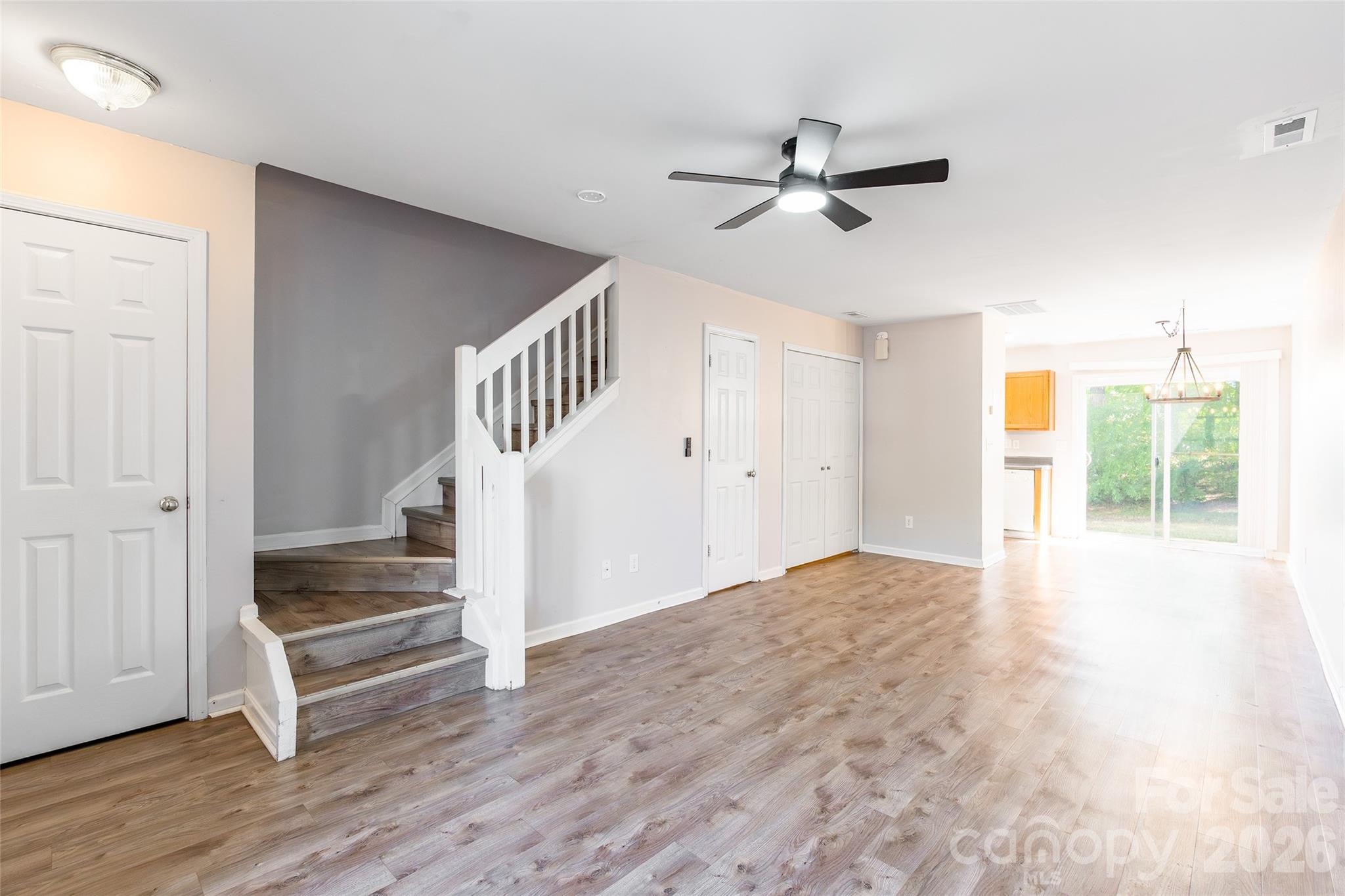 4024 Ashby Lane Fort Mill, SC 29707 - Photo 3 of 21 a view of empty room with wooden floor and fan