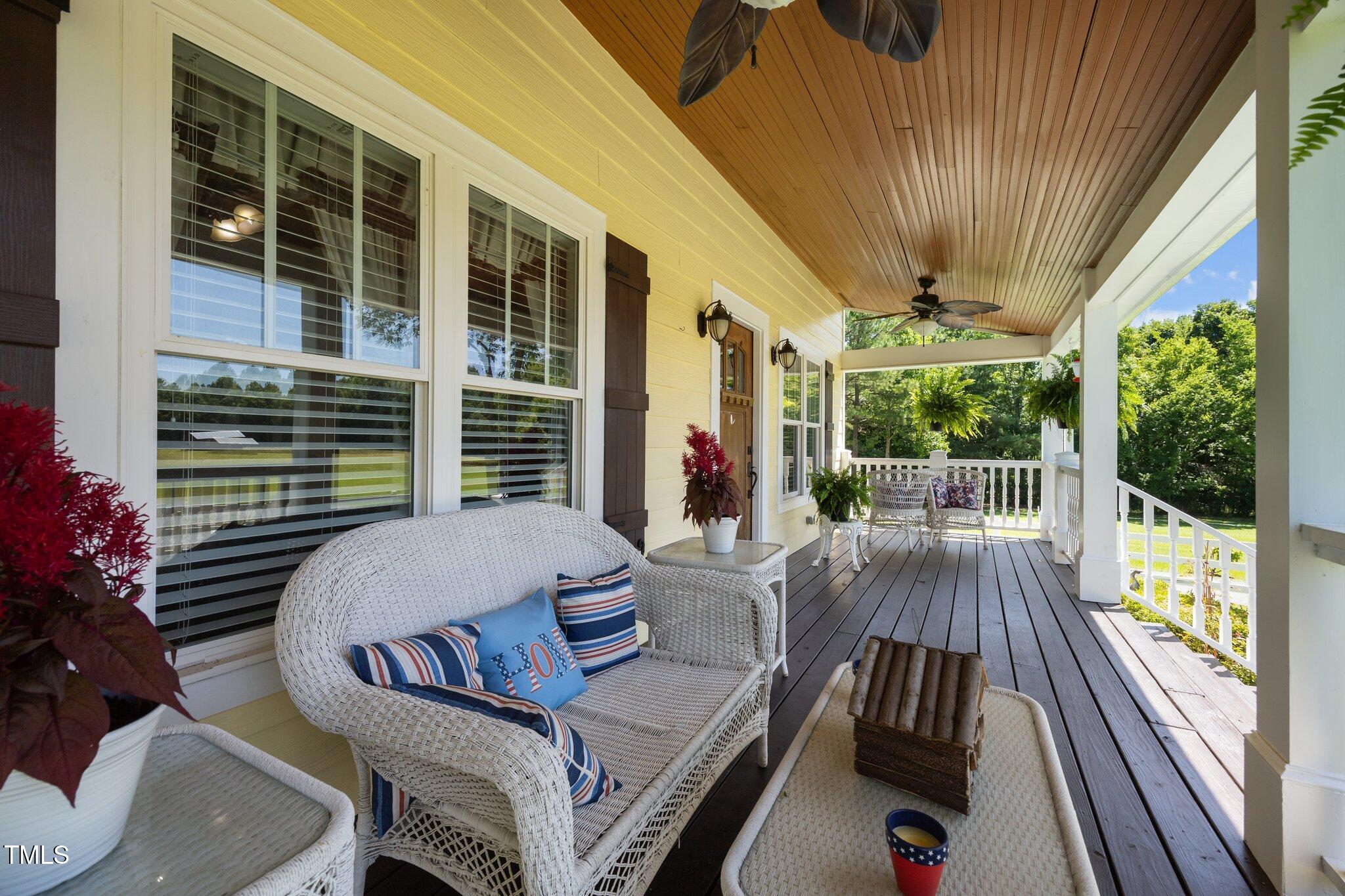 4050 Culbreth Road Stem, NC 27581 - Photo 34 of 46 a view of balcony with furniture and garden
