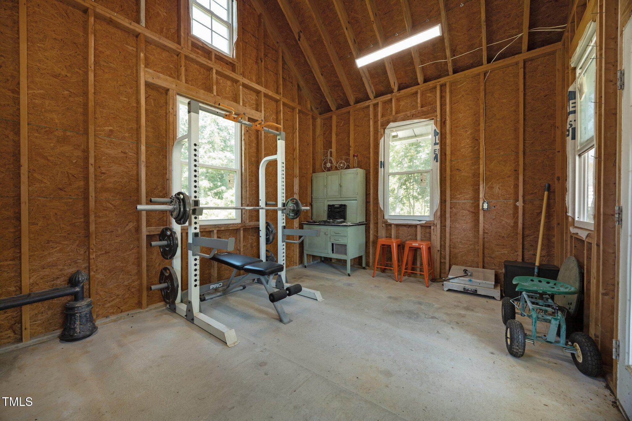 4050 Culbreth Road Stem, NC 27581 - Photo 36 of 46 a view of a room with gym equipment