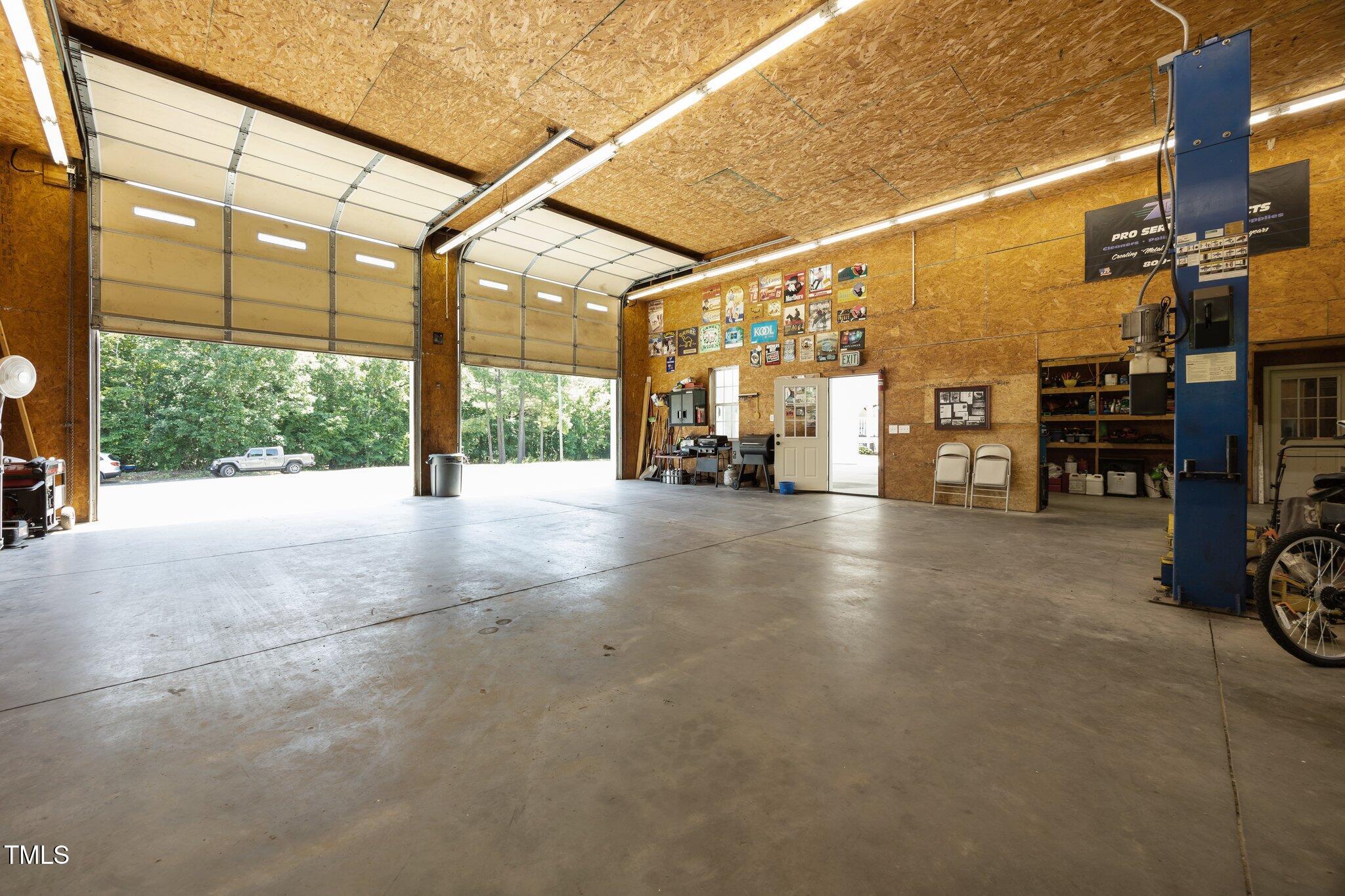 4050 Culbreth Road Stem, NC 27581 - Photo 44 of 46 a view of a street with seating area