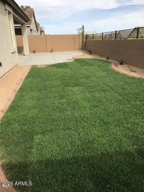 13655 West Briles Road Peoria, AZ 85383 - Photo 17 of 20 a view of a field of grass and trees