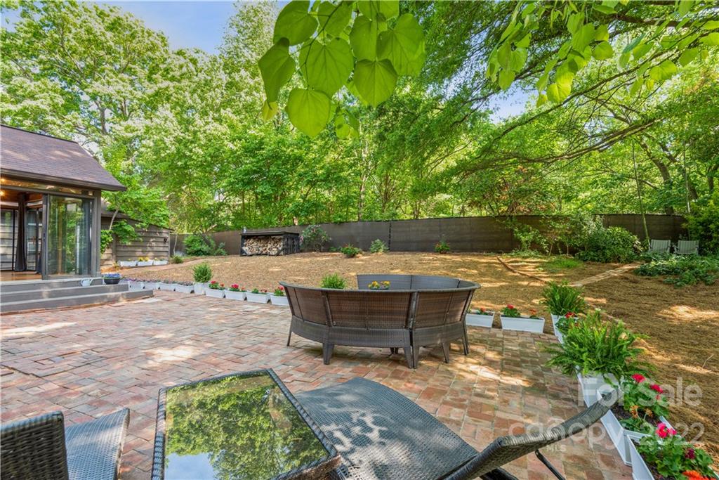7607 Alexander Road Charlotte, NC 28270 - Photo 29 of 34 a view of a backyard with sitting area
