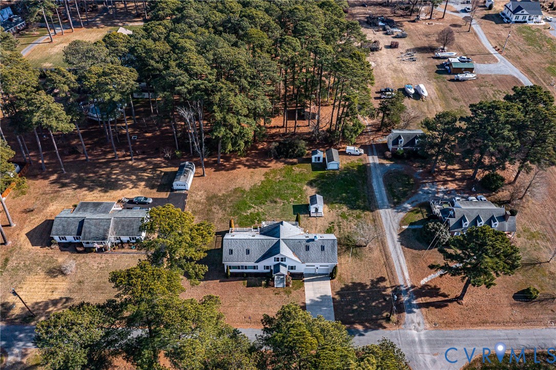 273 Sutton Avenue Reedville, VA 22539 - Photo 43 of 50 an aerial view of a house with outdoor space