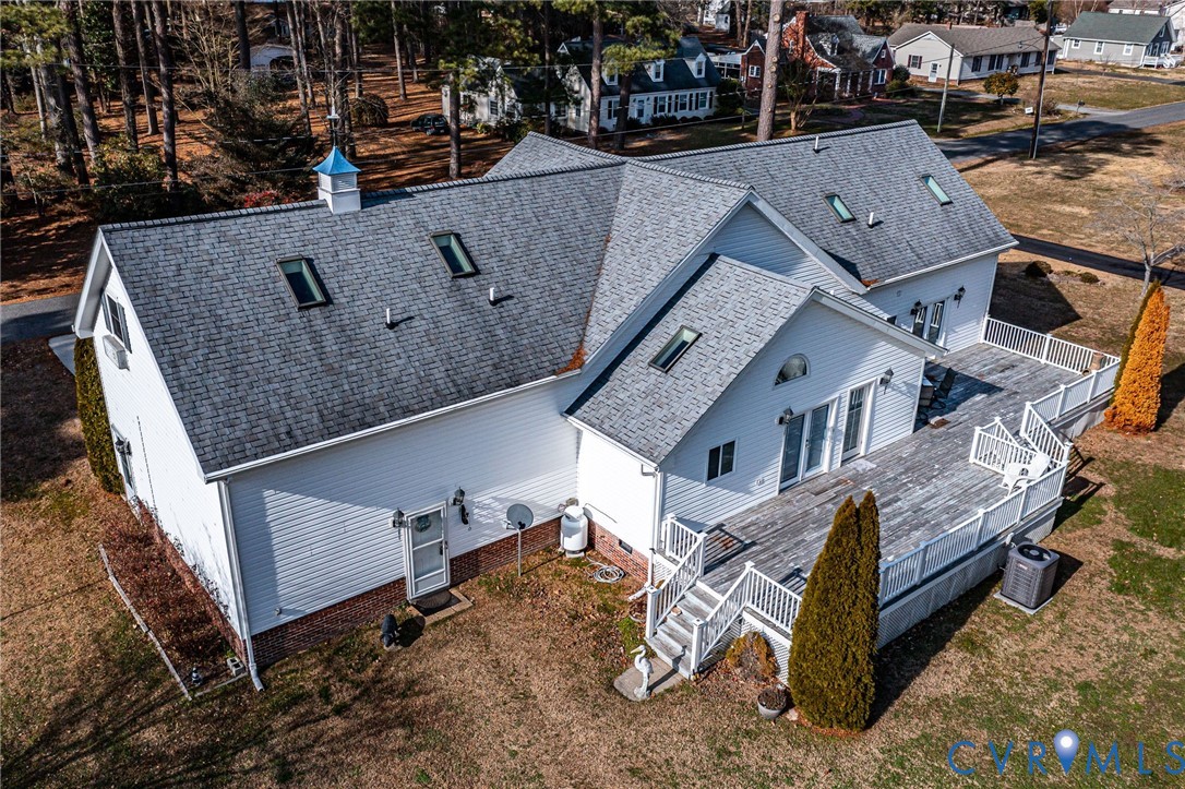 273 Sutton Avenue Reedville, VA 22539 - Photo 50 of 50 an aerial view of a house with a yard