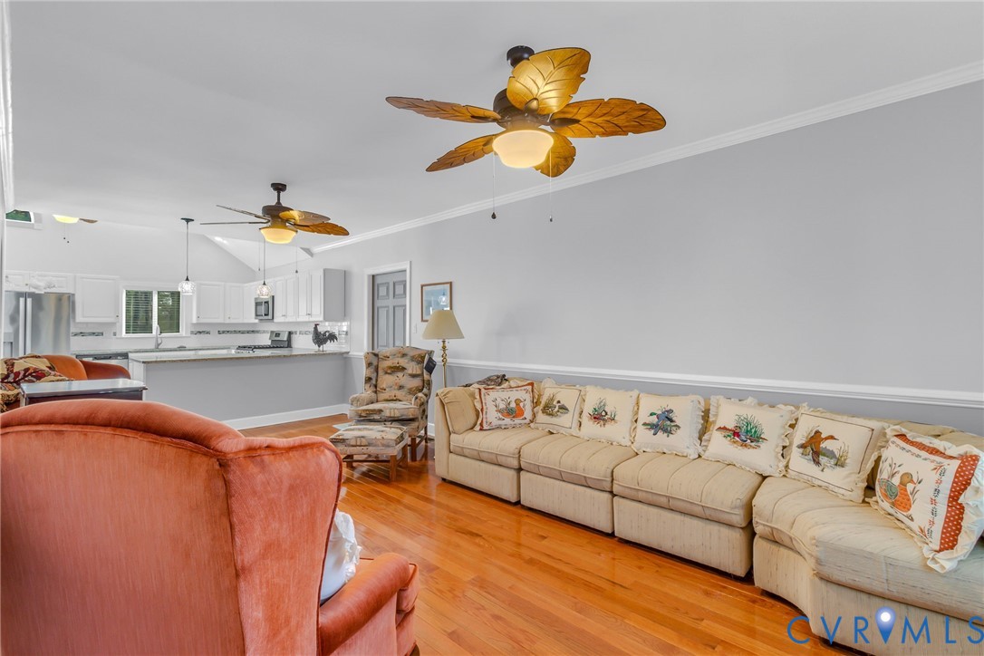273 Sutton Avenue Reedville, VA 22539 - Photo 6 of 50 a living room with furniture