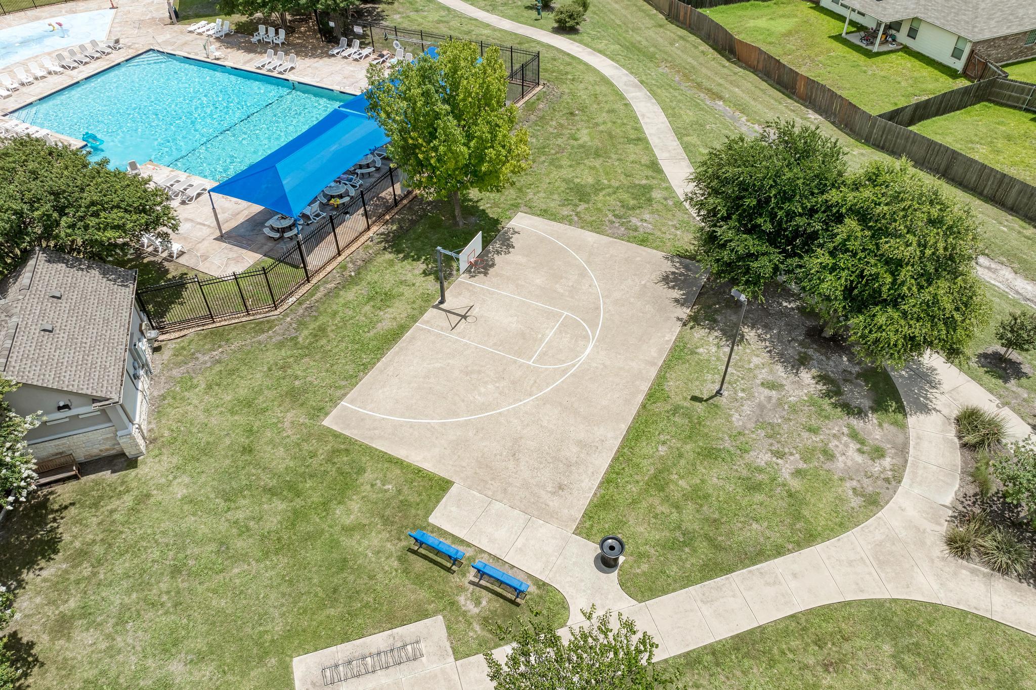 18308 Shallow Pool Drive Pflugerville, TX 78660 - Photo 36 of 40 Community basketball court!