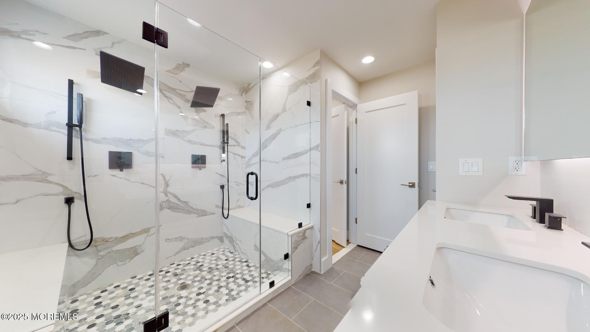 1 Howland Avenue Long Branch, NJ 07740 - Photo 12 of 22 a bathroom with a sink and a shower