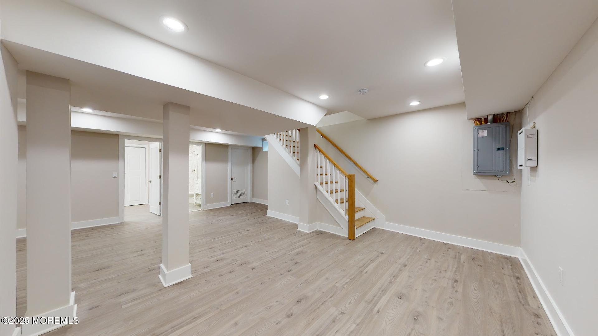 1 Howland Avenue Long Branch, NJ 07740 - Photo 20 of 22 an empty room with wooden floor and windows