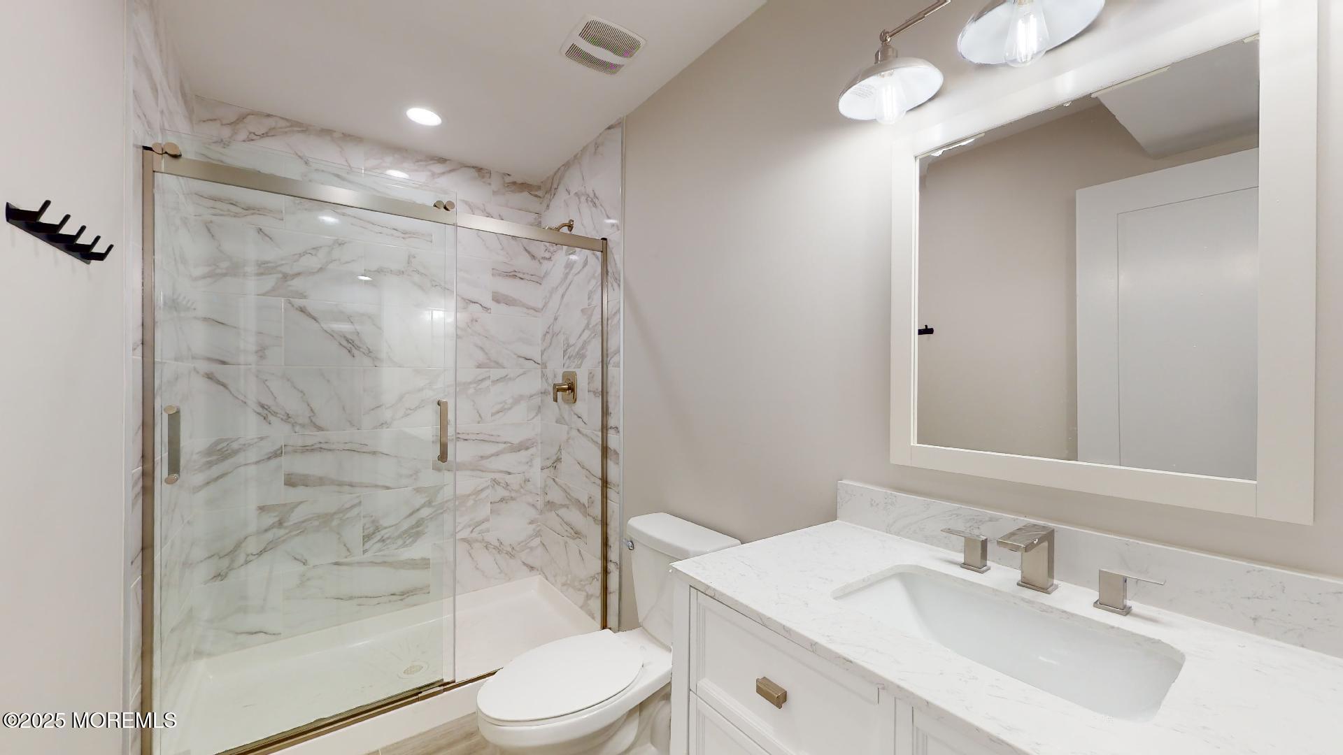 1 Howland Avenue Long Branch, NJ 07740 - Photo 21 of 22 a bathroom with a sink toilet and shower