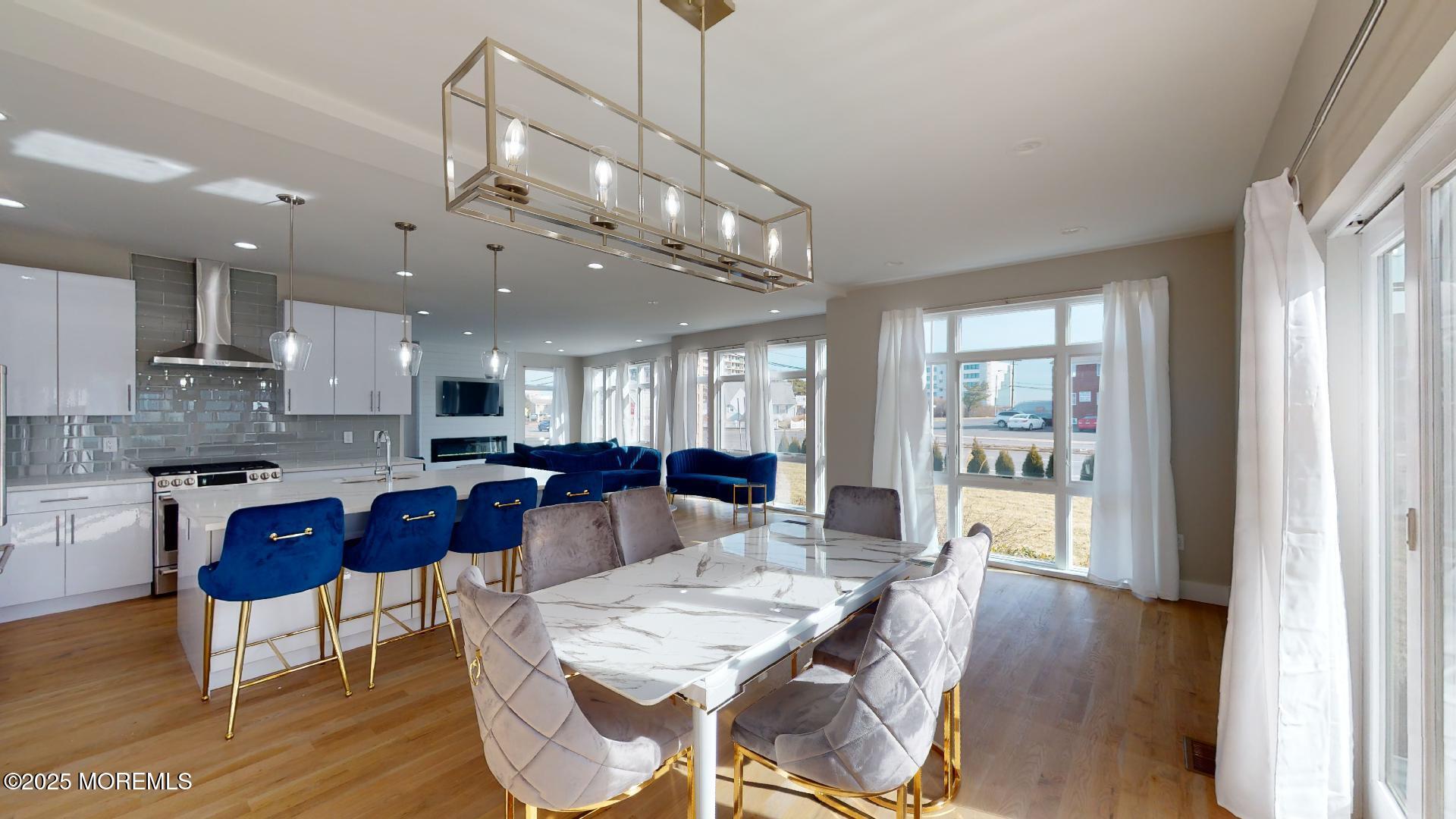 1 Howland Avenue Long Branch, NJ 07740 - Photo 8 of 22 a large kitchen with a table and chairs