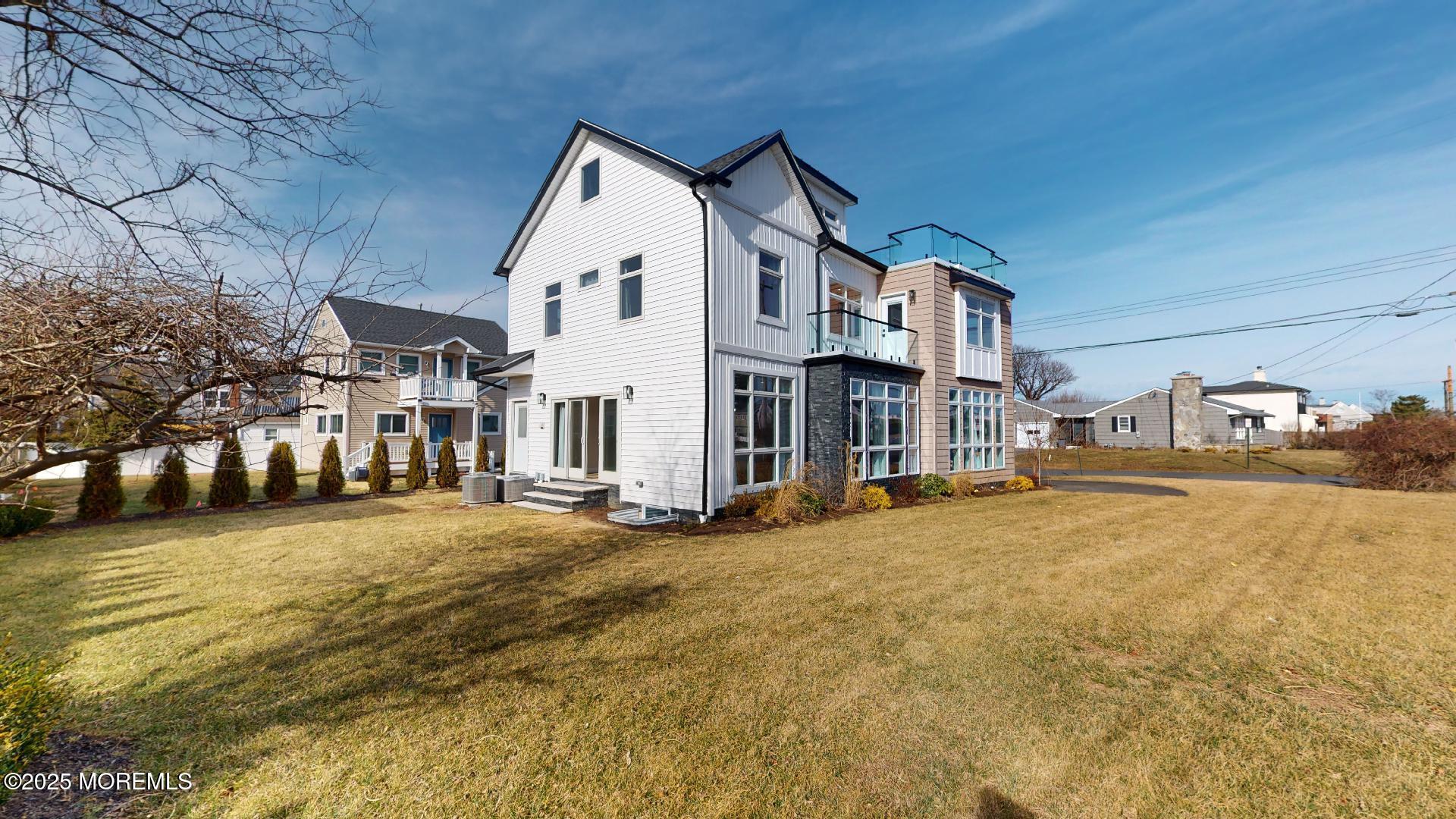 1 Howland Avenue Long Branch, NJ 07740 - Photo 9 of 22 a view of a house with a yard