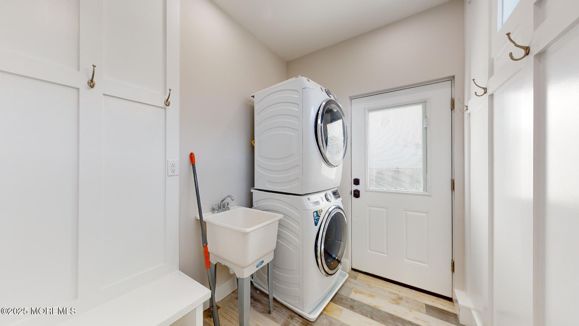 1 Howland Avenue Long Branch, NJ 07740 - Photo 10 of 22 a utility room with dryer and washer