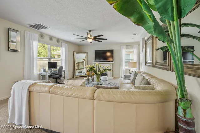 a large kitchen with stainless steel appliances granite countertop a stove a sink and a microwave