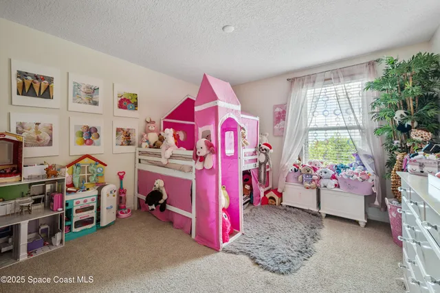 a view of a hallway with front door