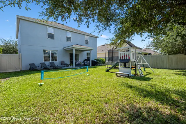 a view of a backyard with a garden